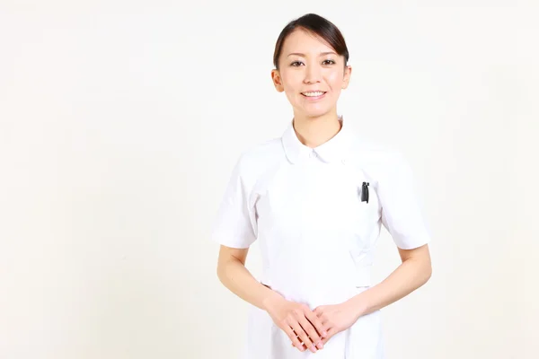 Pleasant young Japanese nurse　 — Stock Photo, Image